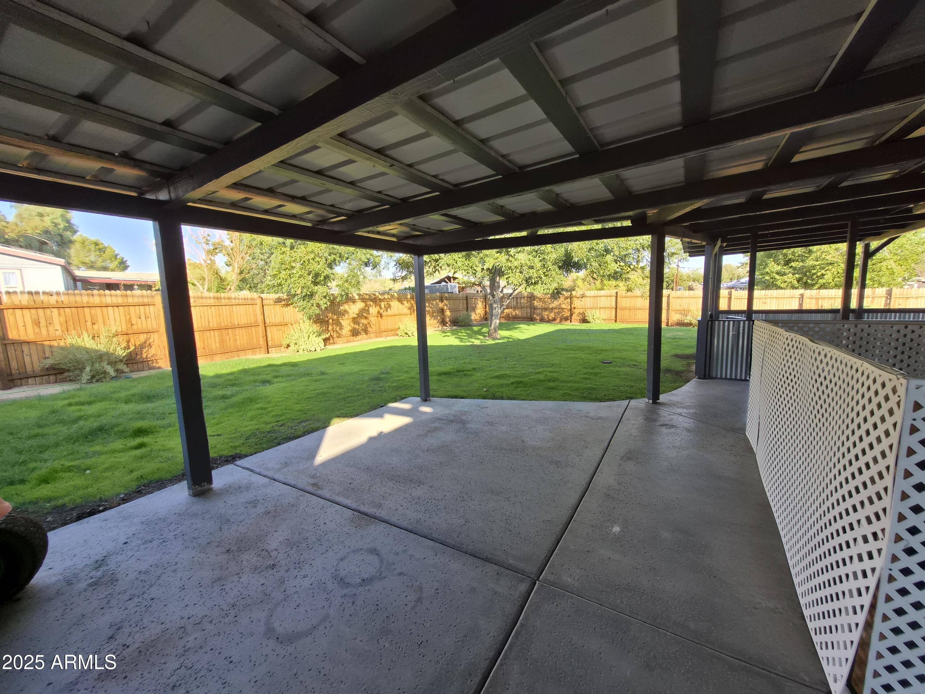 51033 North Mockingbird Road Wickenburg, AZ 85390 - Photo 34 of 51 a view of porch with a backyard