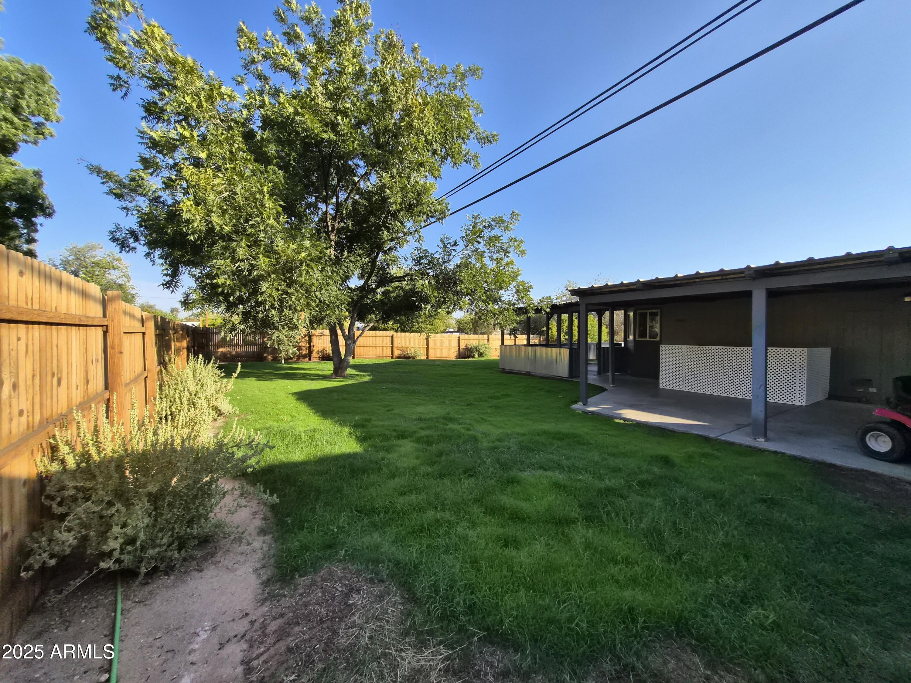 51033 North Mockingbird Road Wickenburg, AZ 85390 - Photo 35 of 51 a view of backyard with green space