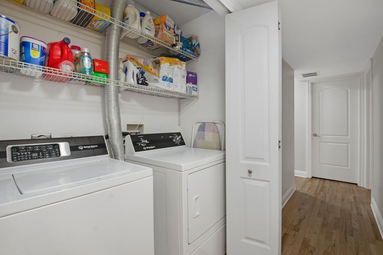 612 Mulford Street, Unit 203 Evanston, IL 60202 - Photo 15 of 19 a utility room with dryer and washer