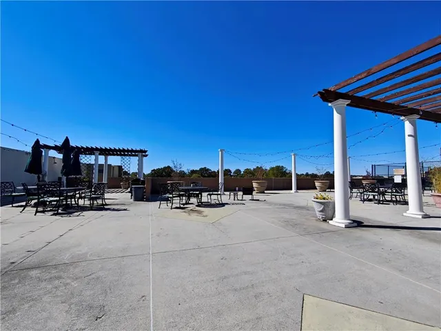 a view of a terrace with chairs