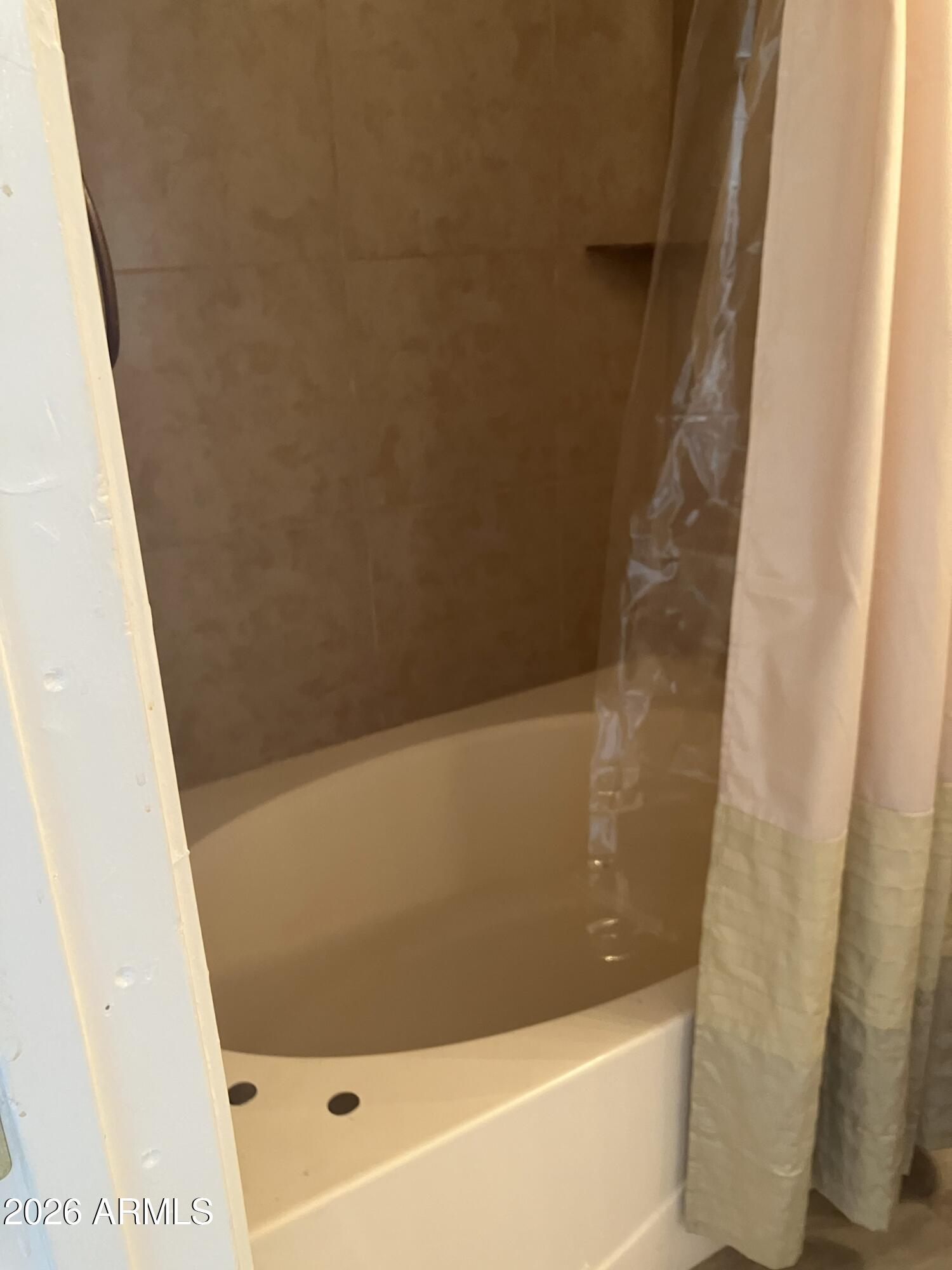 2523 East Contention Mine Road, Unit 41 Phoenix, AZ 85032 - Photo 15 of 19 a bathroom with a bathtub