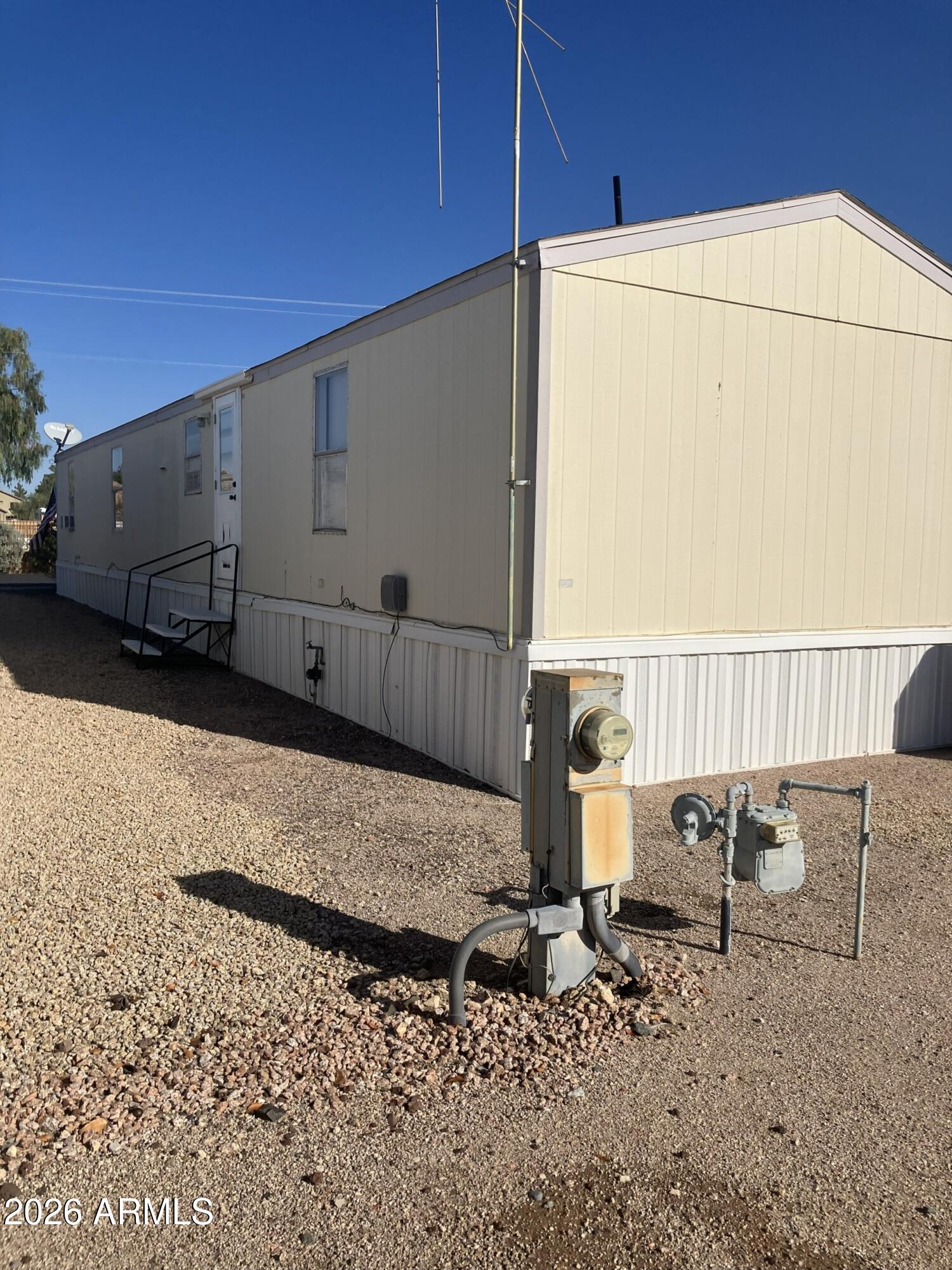2523 East Contention Mine Road, Unit 41 Phoenix, AZ 85032 - Photo 4 of 19 a view of a backyard with sitting area