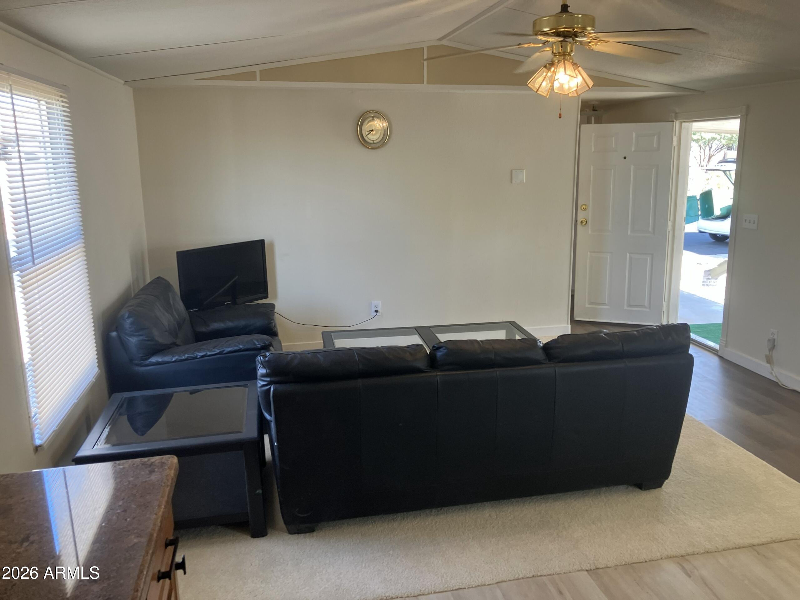 2523 East Contention Mine Road, Unit 41 Phoenix, AZ 85032 - Photo 8 of 19 a living room with furniture and a window