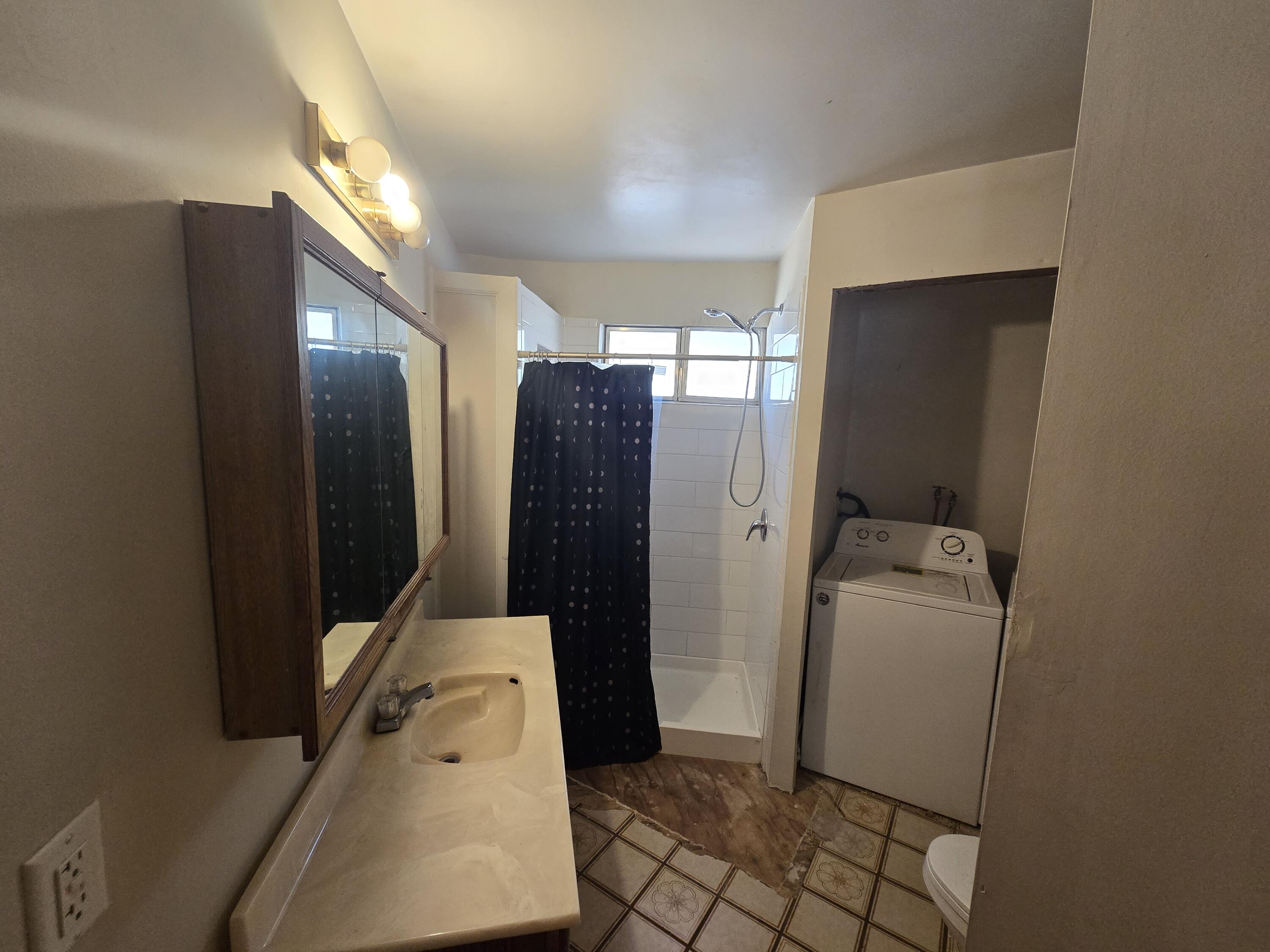 18353 Old Oasis Road Redding, CA 96003 - Photo 12 of 22 a bathroom with a sink and a mirror
