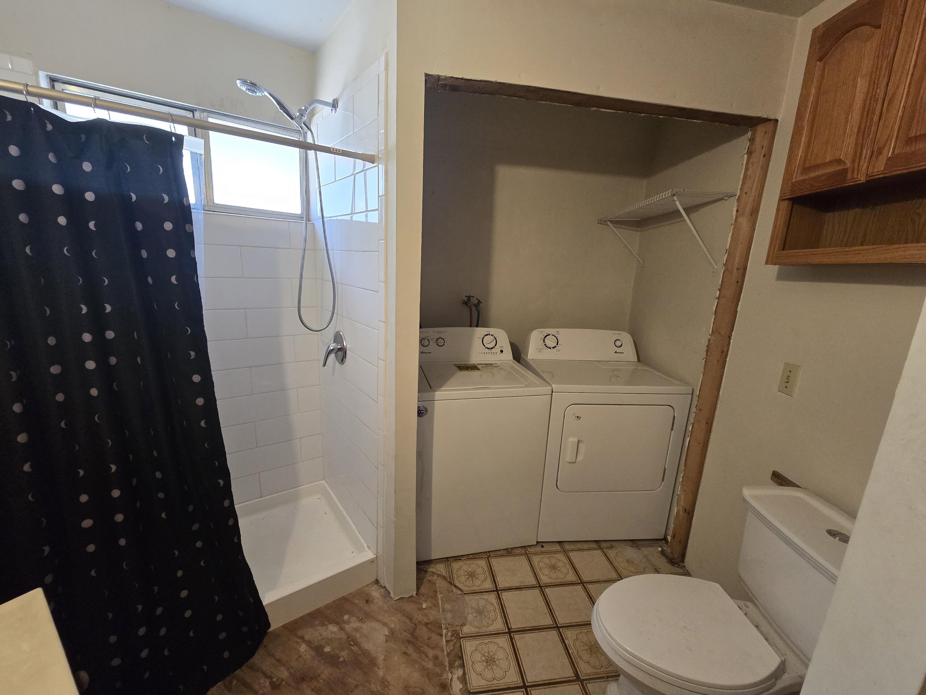 18353 Old Oasis Road Redding, CA 96003 - Photo 13 of 22 a bathroom with a sink toilet and shower