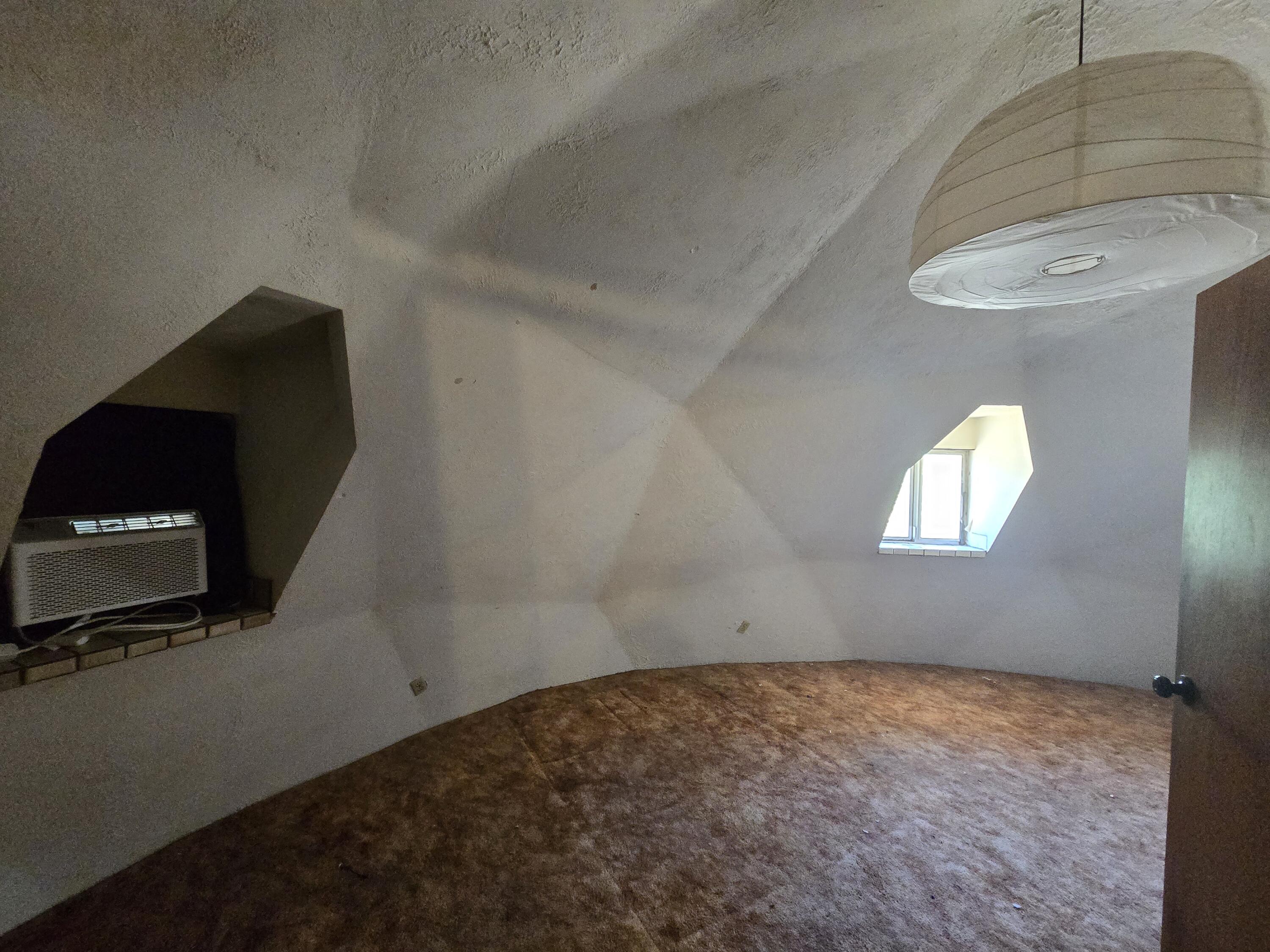 18353 Old Oasis Road Redding, CA 96003 - Photo 14 of 22 a view of an empty room and window