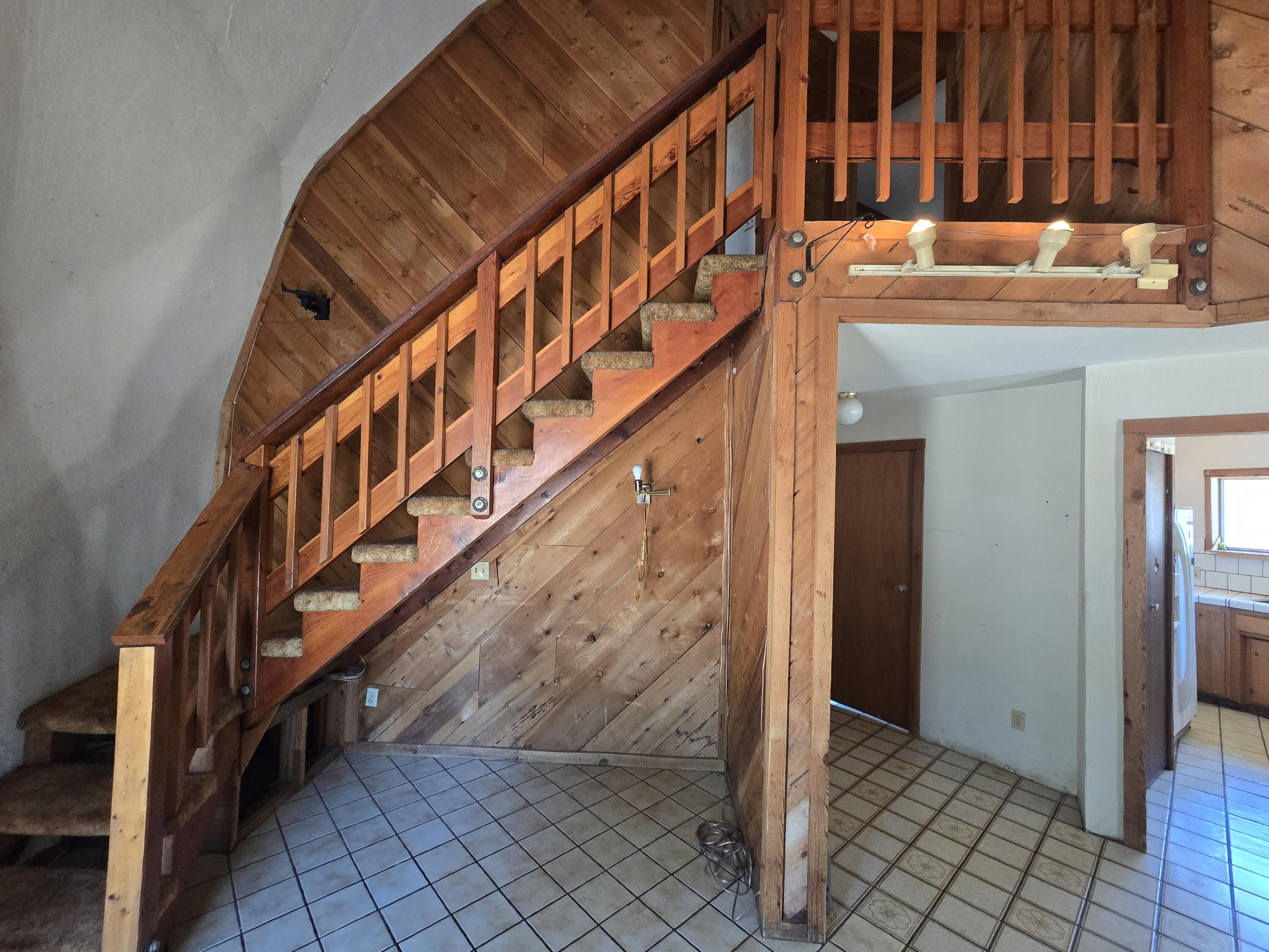 18353 Old Oasis Road Redding, CA 96003 - Photo 9 of 22 a view of staircase with wooden stairs