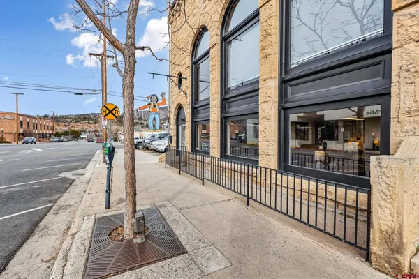 a city street lined with tall buildings