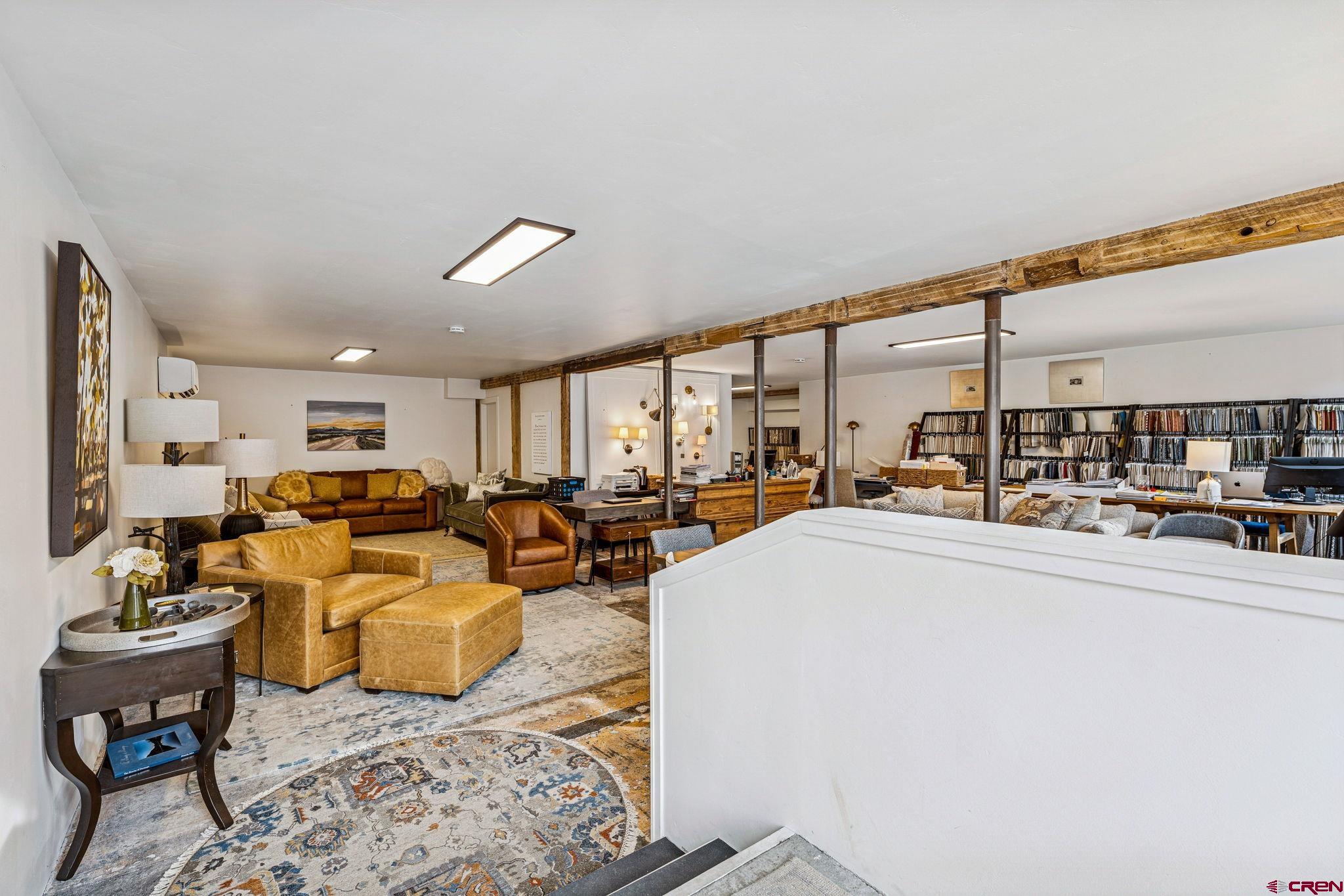 120 West 9th Street Durango, CO 81301 - Photo 5 of 37 a living room with furniture kitchen view and a large window