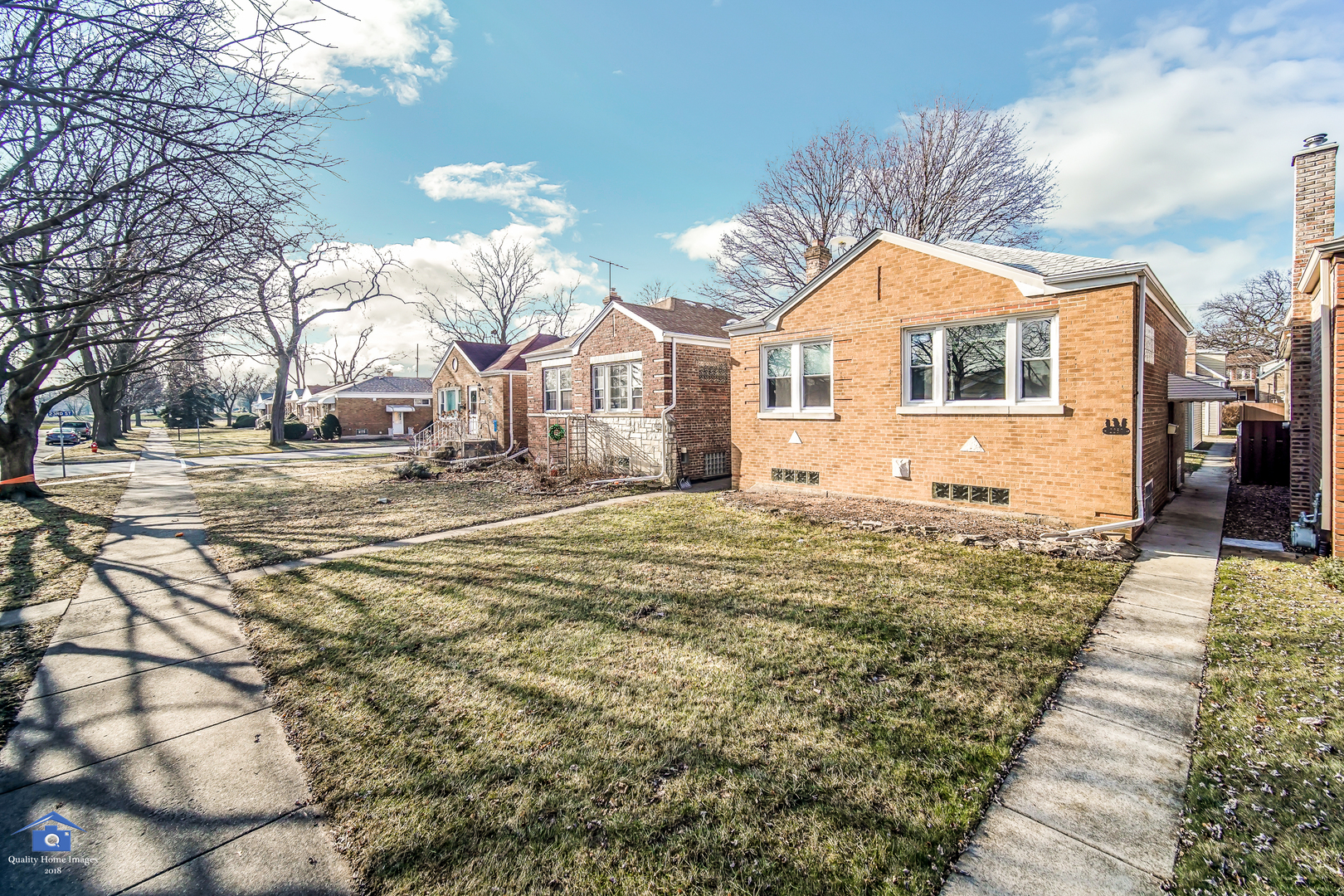 2250 Forest Avenue North Riverside, IL 60546 - Photo 3 of 29 a front view of a house with a yard