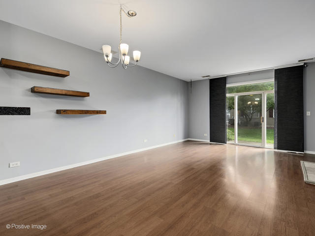 835 Genesee Drive Naperville, IL 60563 - Photo 4 of 18 a view of an empty room with glass door