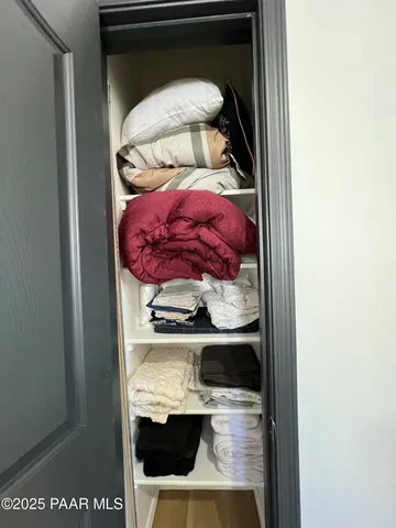 a bathroom with a double vanity sink and mirror