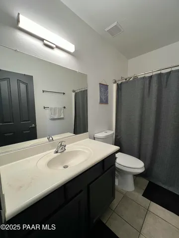 a front view of a house with parking