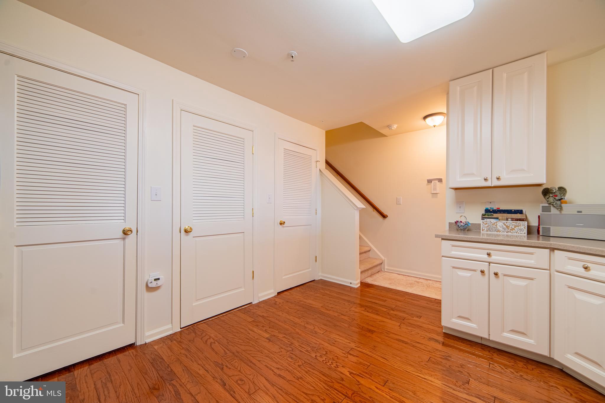 61 Dockside Drive Somers Point, NJ 08244 - Photo 12 of 23 a view of a kitchen with wooden floor and staircase