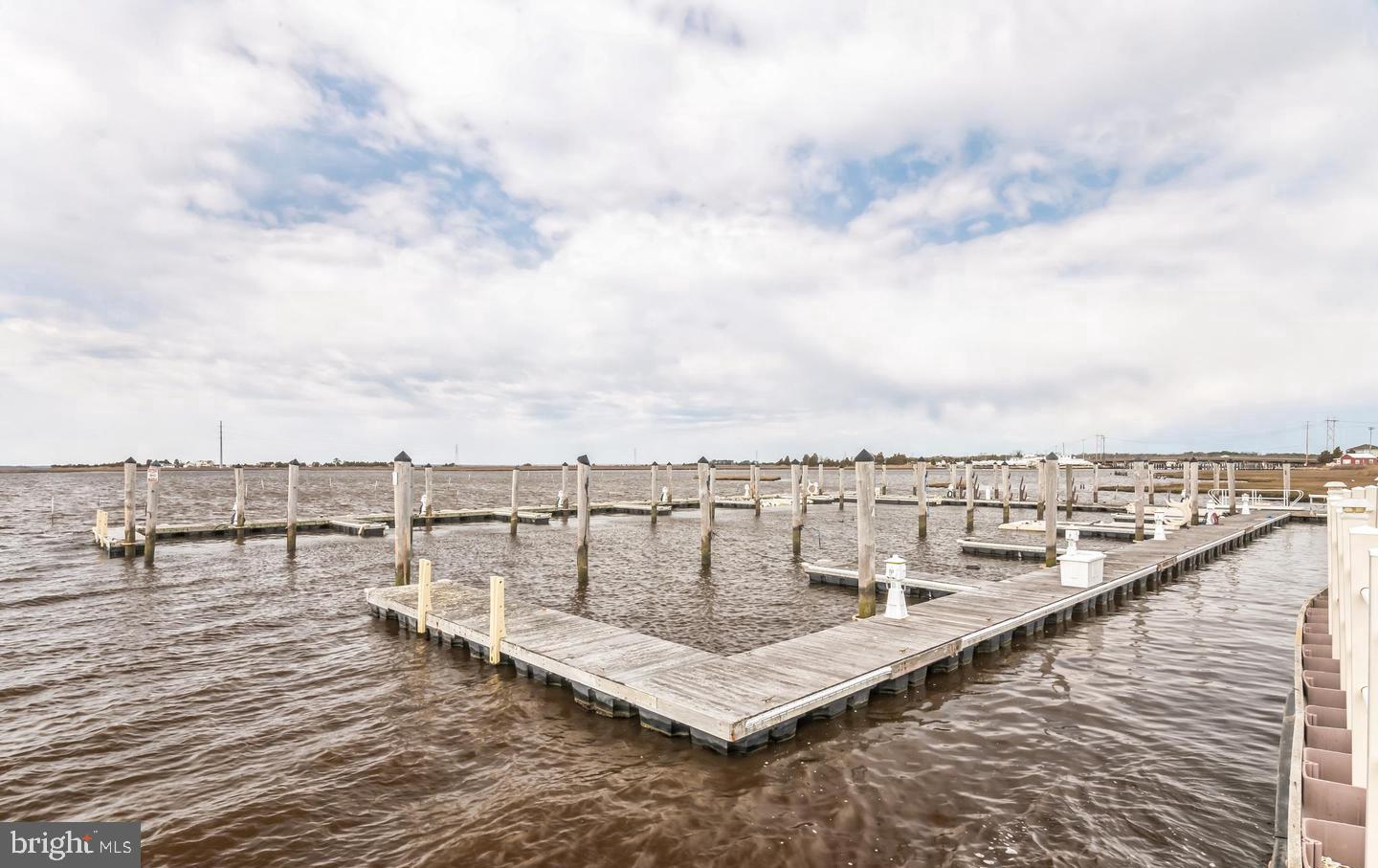 61 Dockside Drive Somers Point, NJ 08244 - Photo 22 of 23 a view of a terrace with lawn chairs