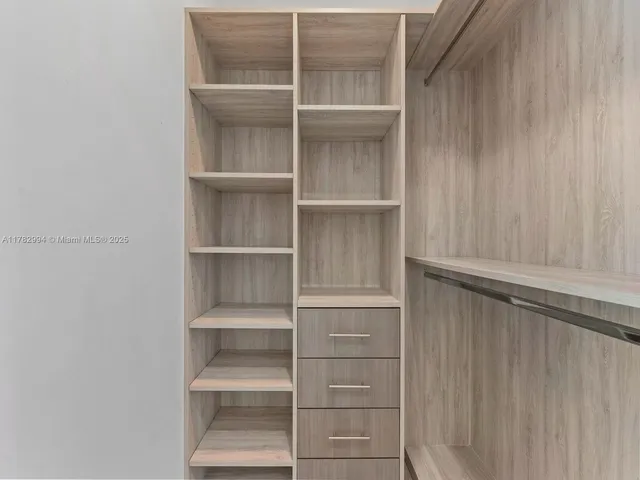 a bathroom with a bathtub and a sink