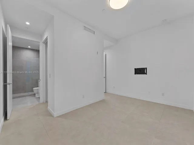 a bathroom with a sink toilet and vanity
