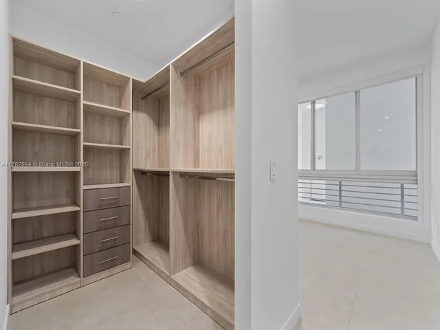 a view of a city with tall buildings