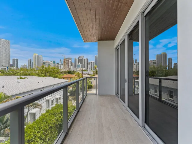 a view of a terrace with sitting area