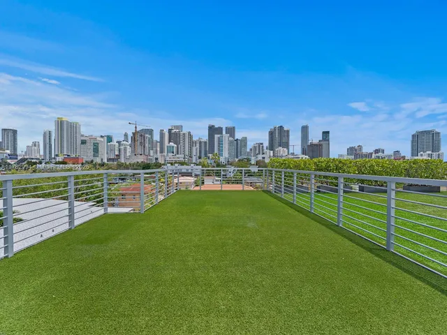 a view of a swimming pool and lounge chair