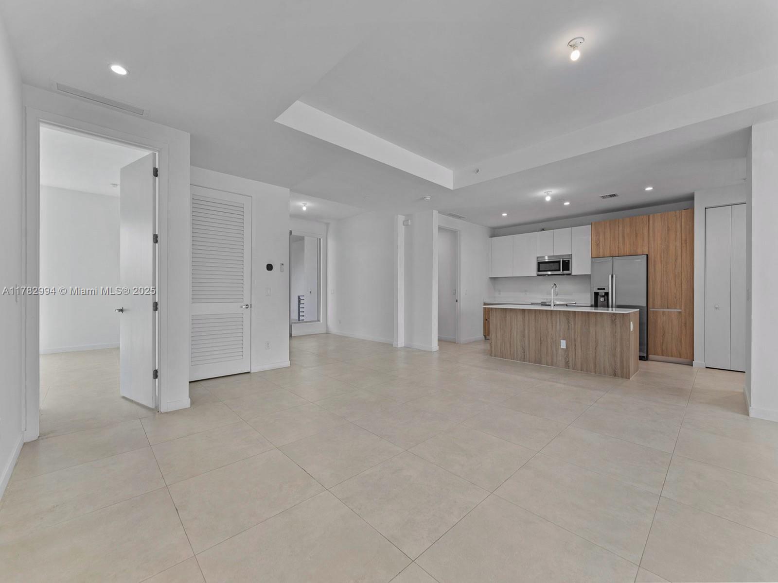 529 Southwest 11th Street, Unit 303 Miami, FL 33129 - Photo 9 of 64 a view of a kitchen with a sink
