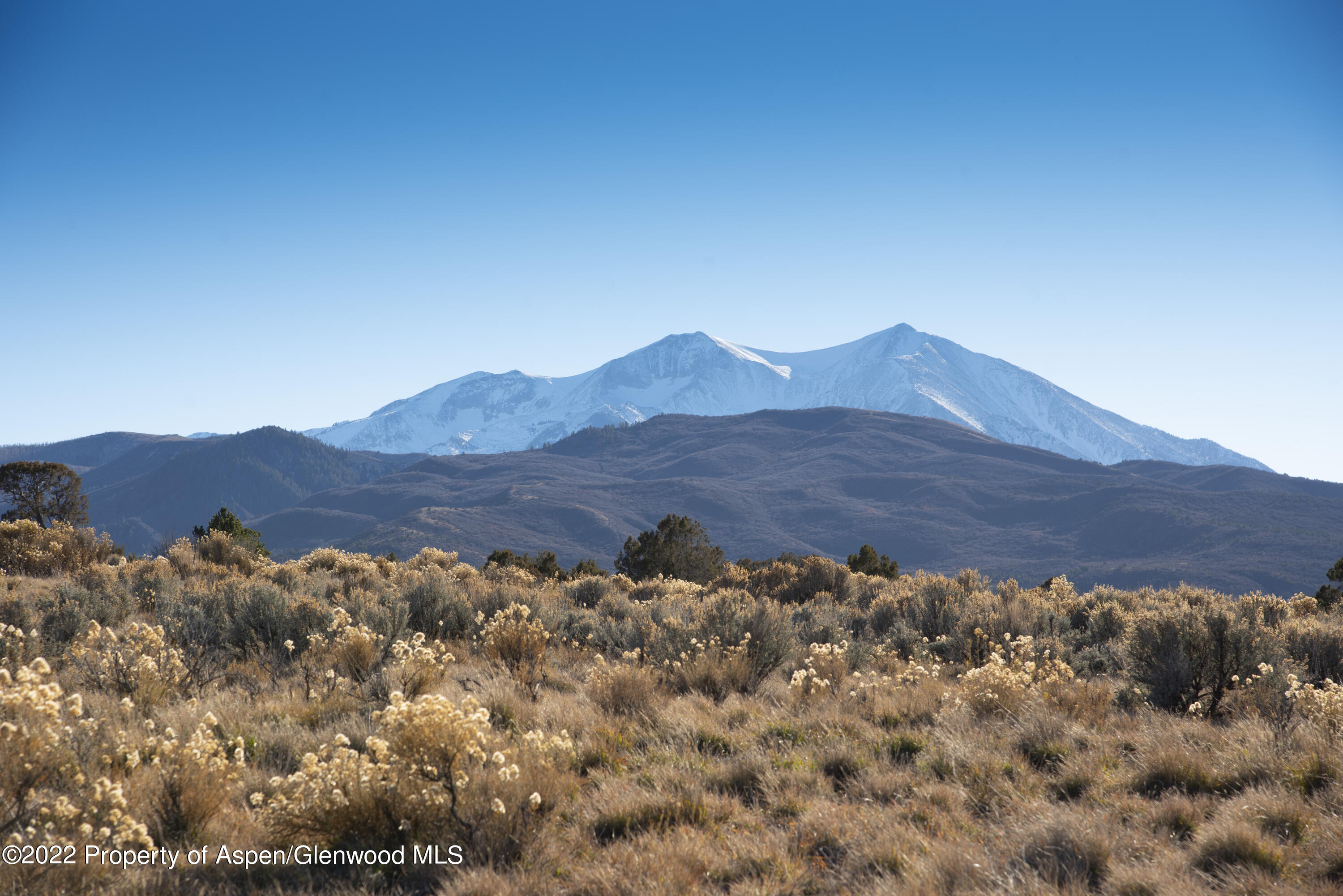 433 Whitecloud Road Carbondale, CO 81623 - Photo 3 of 6 a view of a large mountain with mountains in the background