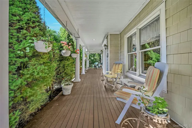 a view of balcony with furniture