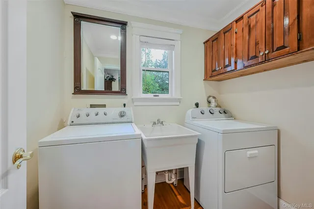 a utility room with dryer and washer