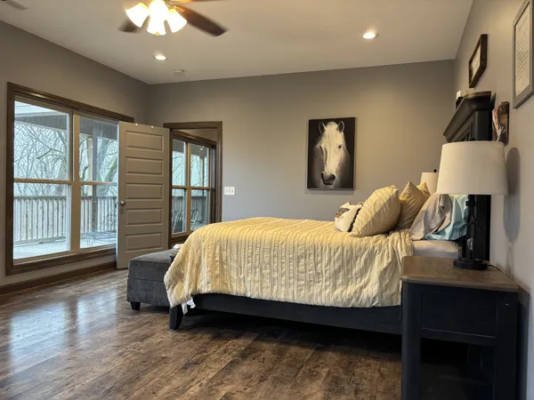 a view of walk in closet with clothes