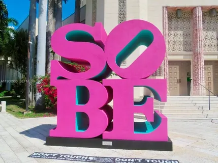 a view of a palm trees in front of a house