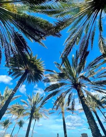 a view of swimming pool with outdoor seating