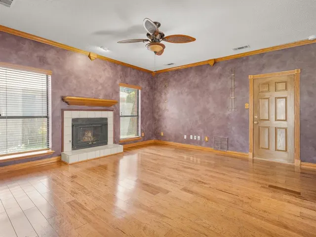 a view of a kitchen with a sink and a window