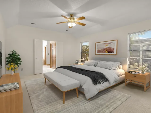 a spacious bathroom with a bathtub and a shower