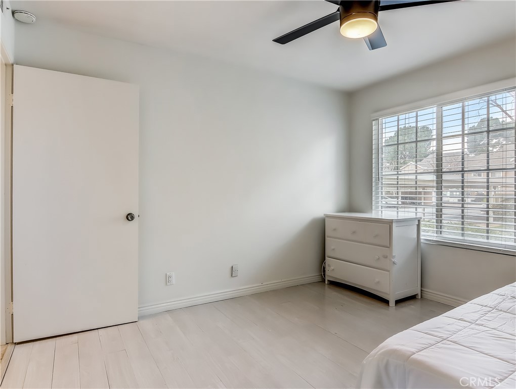98 Greenfield, Unit 95 Irvine, CA 92614 - Photo 31 of 48 a view of room with window and a ceiling fan