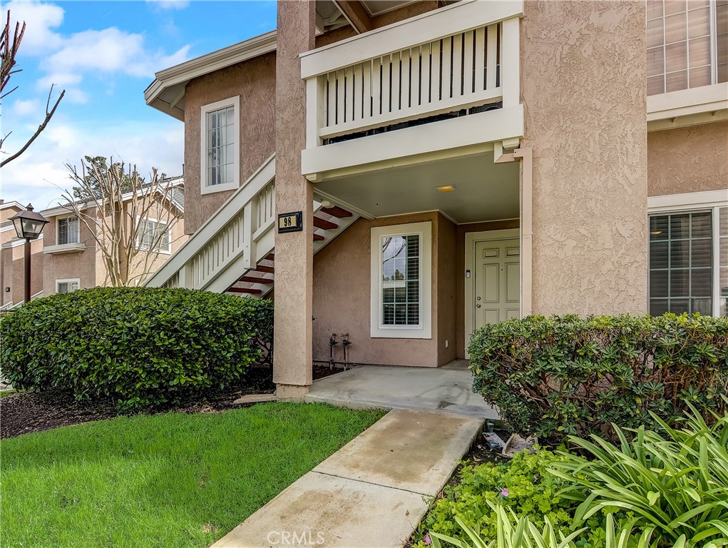 98 Greenfield, Unit 95 Irvine, CA 92614 - Photo 35 of 48 front view of a house with a yard