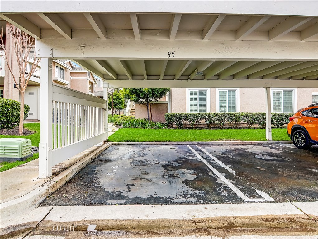 98 Greenfield, Unit 95 Irvine, CA 92614 - Photo 39 of 48 a view of a building with a garden