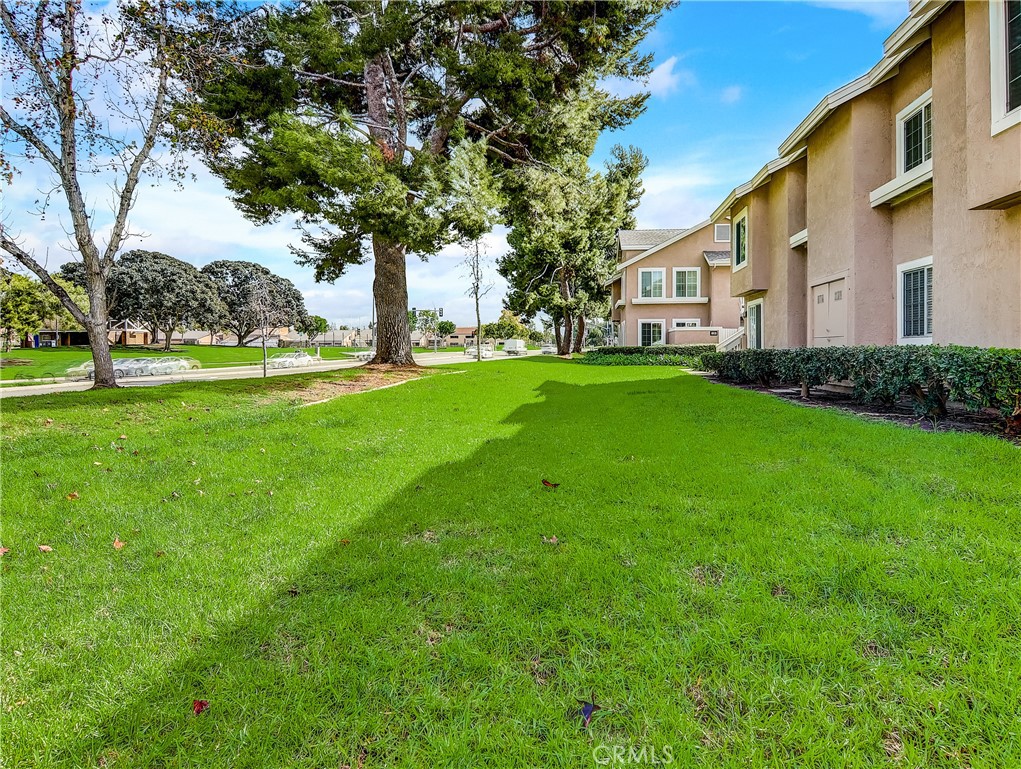 98 Greenfield, Unit 95 Irvine, CA 92614 - Photo 40 of 48 a view of a house with a yard