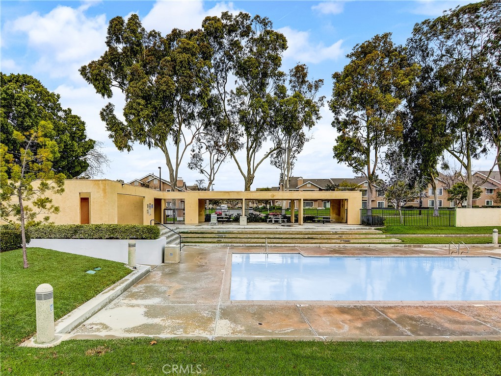 98 Greenfield, Unit 95 Irvine, CA 92614 - Photo 46 of 48 a view of a house with a big yard