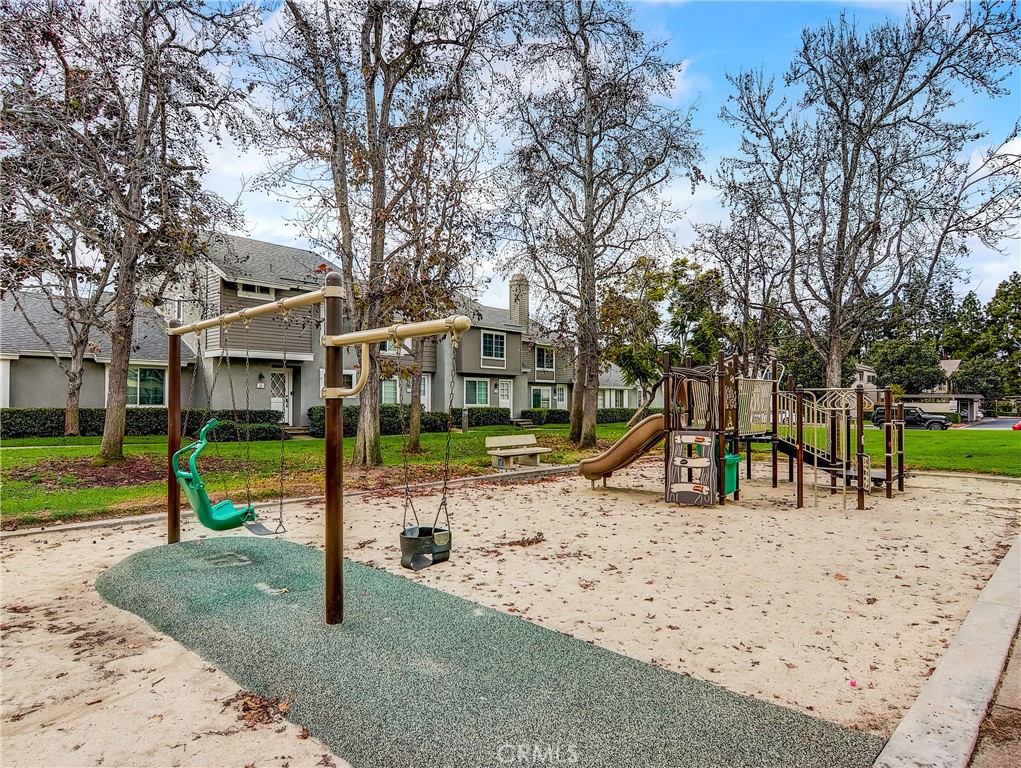 98 Greenfield, Unit 95 Irvine, CA 92614 - Photo 48 of 48 a view of a park with slide