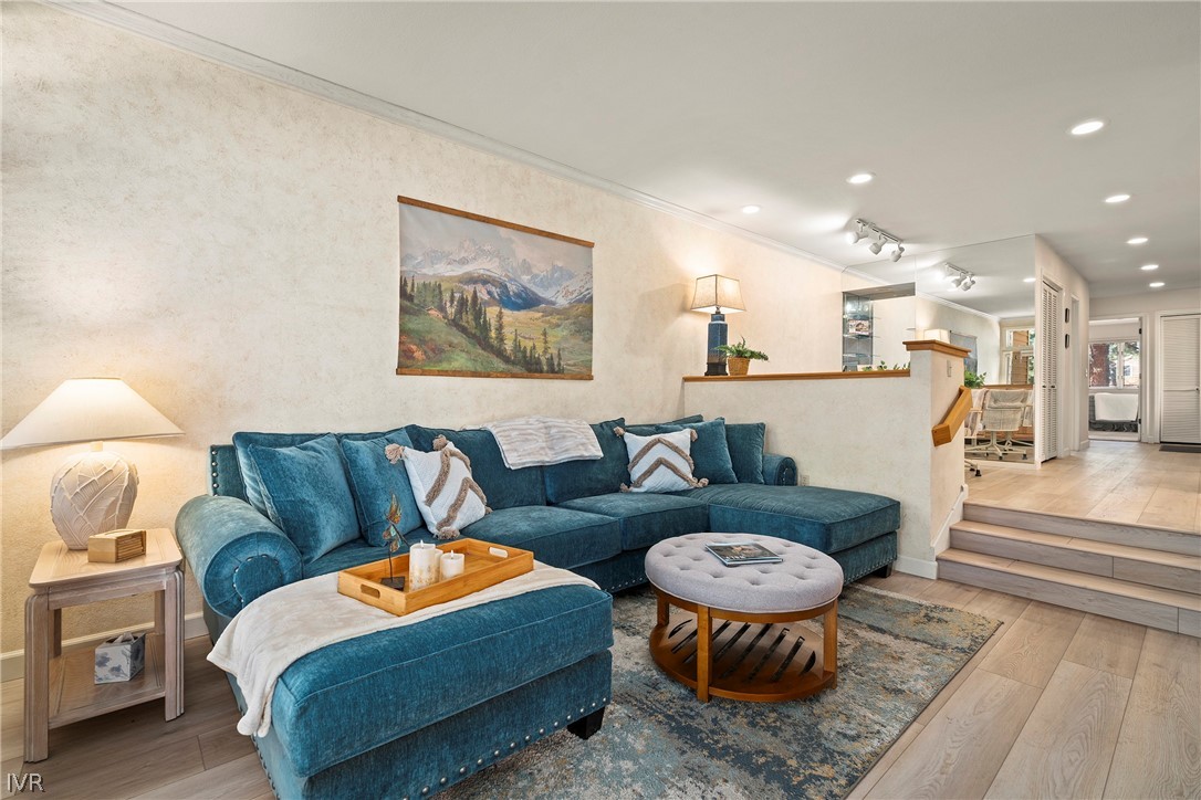 931 Incline Way, Unit 230 Incline Village, NV 89451 - Photo 2 of 24 a living room with furniture and a rug