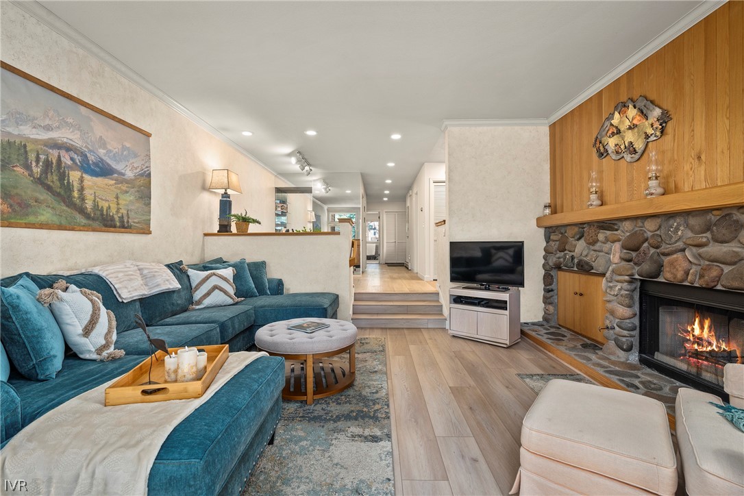 931 Incline Way, Unit 230 Incline Village, NV 89451 - Photo 3 of 24 a living room with furniture and a fireplace