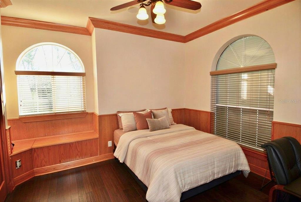 3605 Stabile Road St. James City, FL 33956 - Photo 11 of 95 a bedroom with a bed and a window
