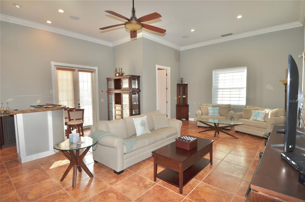 3605 Stabile Road St. James City, FL 33956 - Photo 34 of 95 a living room with furniture and a large window