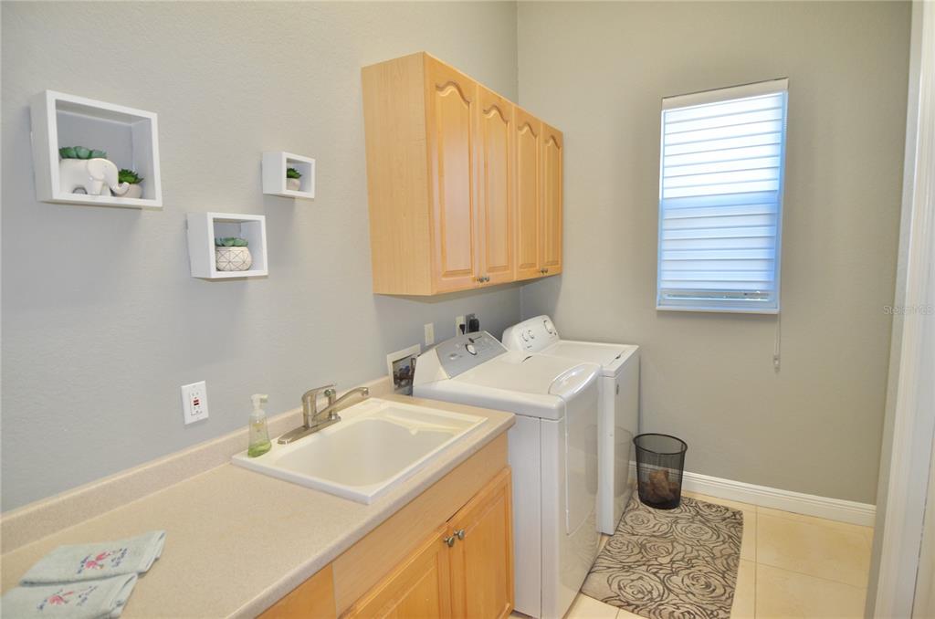 3605 Stabile Road St. James City, FL 33956 - Photo 42 of 95 a bathroom with a sink and a mirror