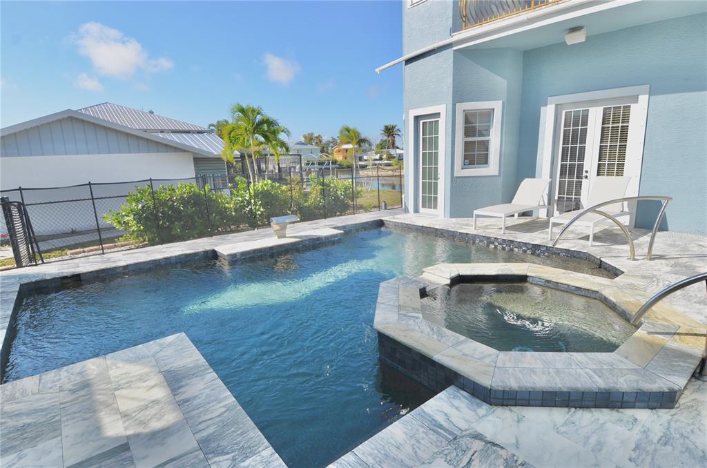 3605 Stabile Road St. James City, FL 33956 - Photo 61 of 95 a living room with furniture and a large window