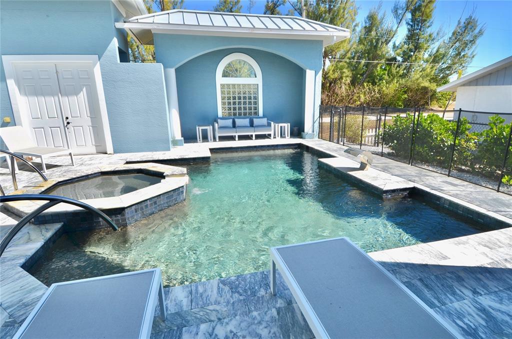 3605 Stabile Road St. James City, FL 33956 - Photo 63 of 95 a view of house with swimming pool
