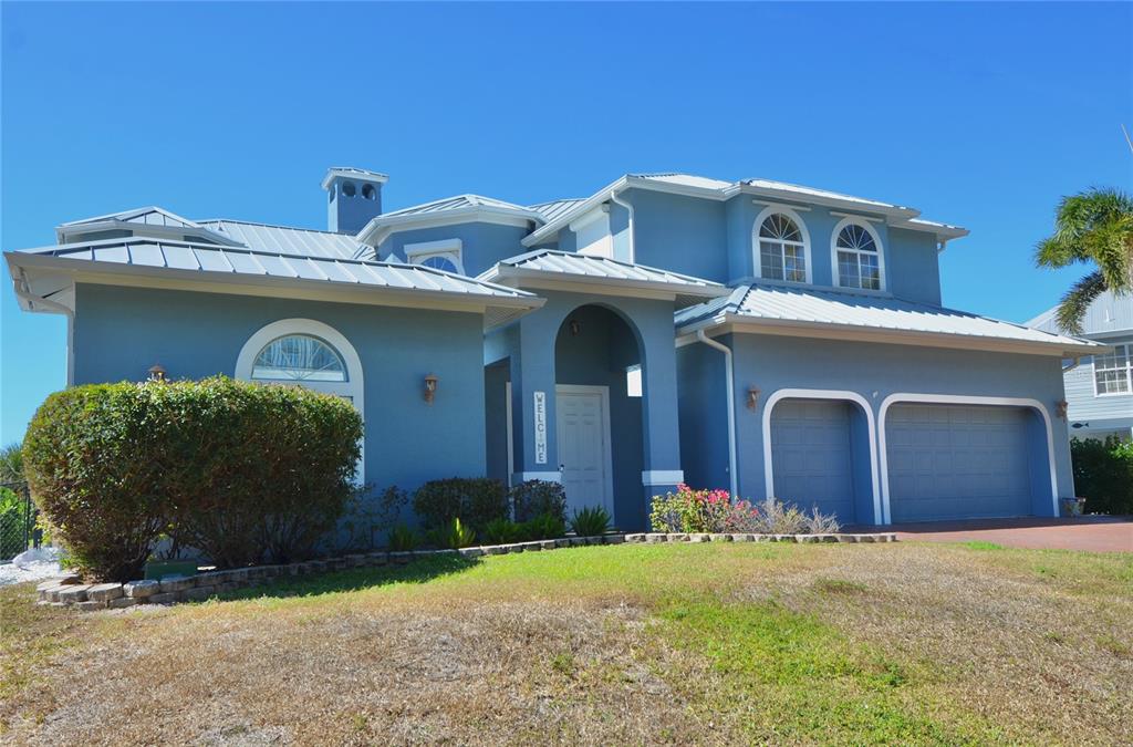 3605 Stabile Road St. James City, FL 33956 - Photo 86 of 95 a front view of a house with yard