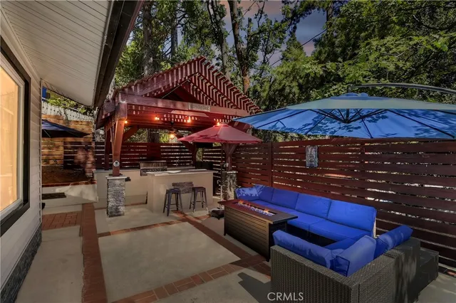 a view of a chairs and tables in the patio