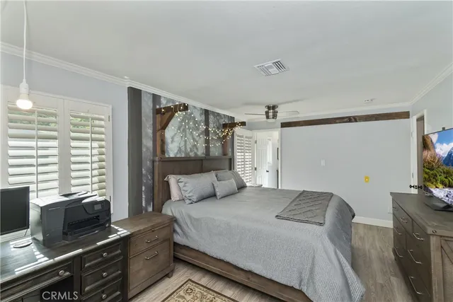 a bathroom with a white bath tub a toilet and a shower curtain