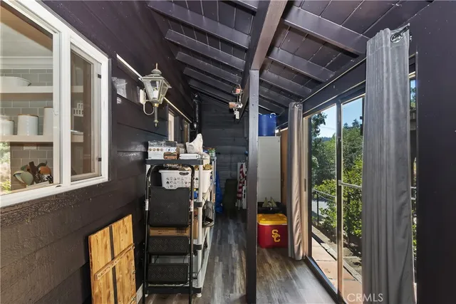 a front view of a house with sitting area